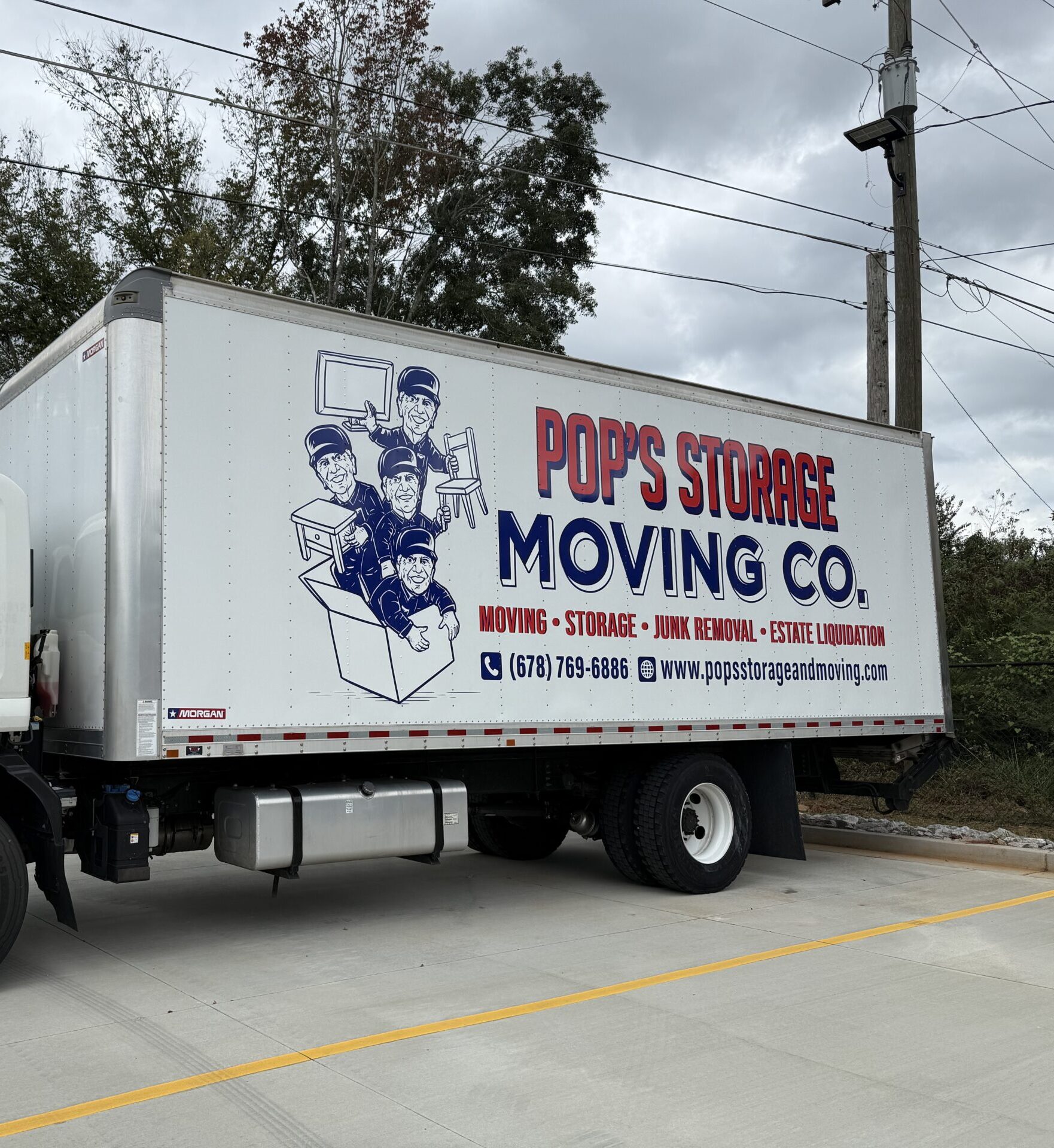 Truck from Pop's Moving, ready for a long-distance moving service