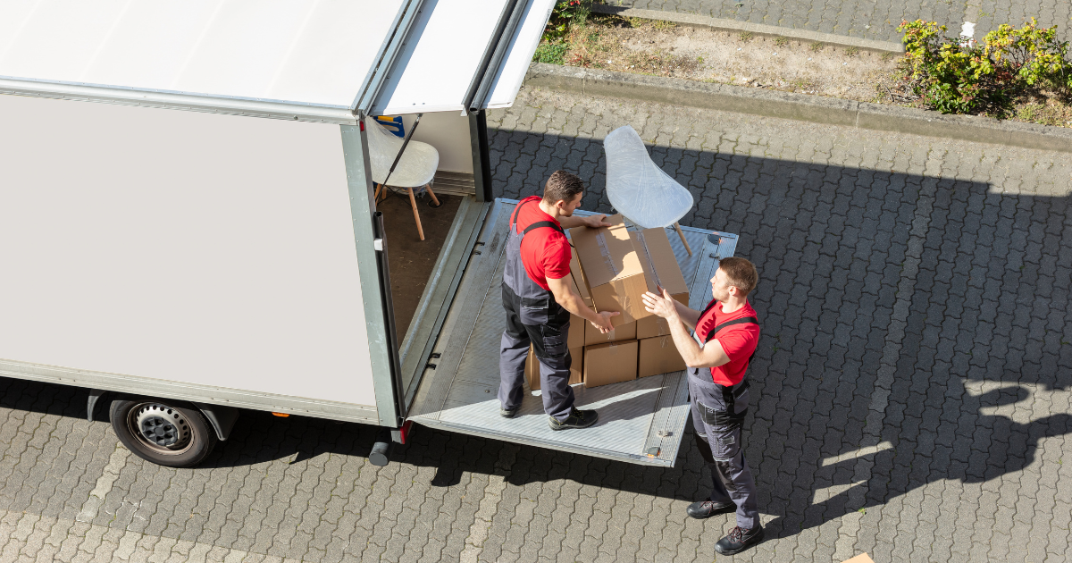 Professionals transporting items to a moving pod
